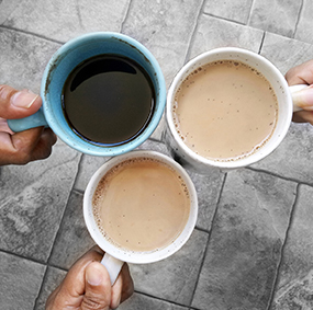 Three mugs filled with coffee